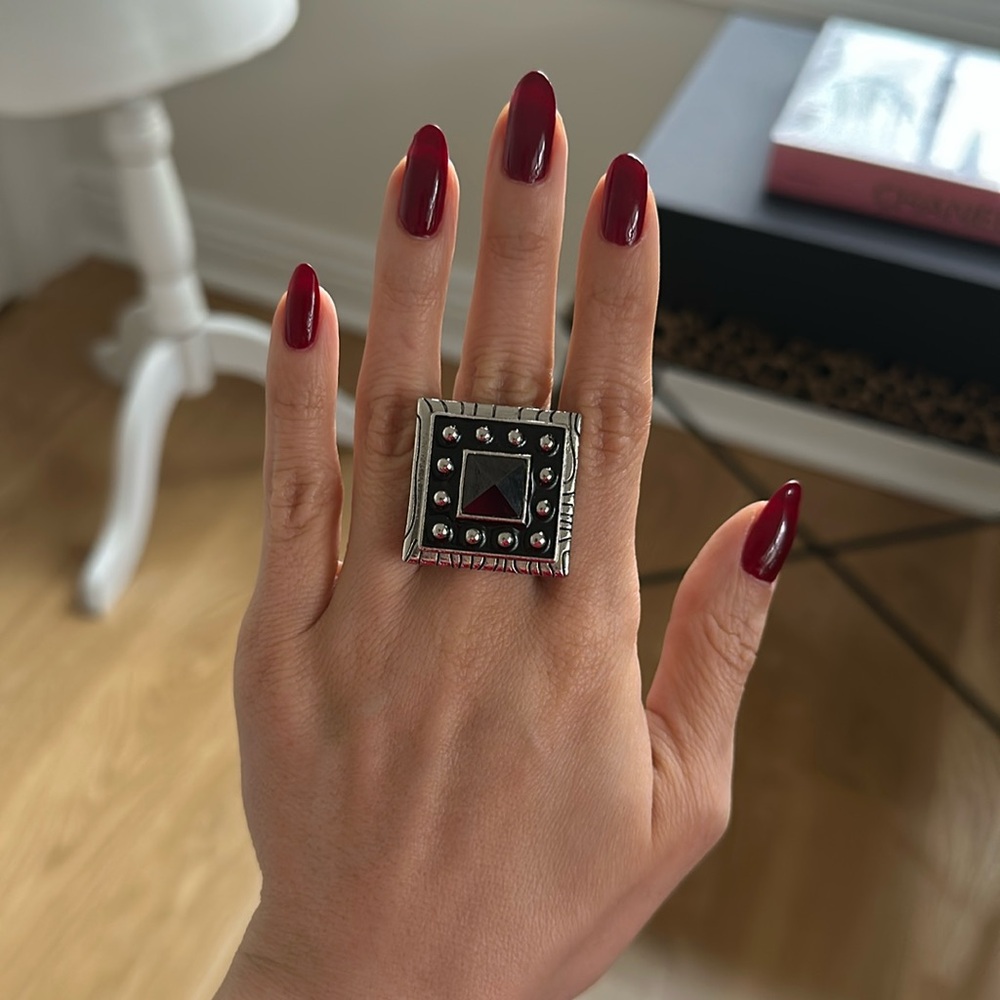 Silver and black ring